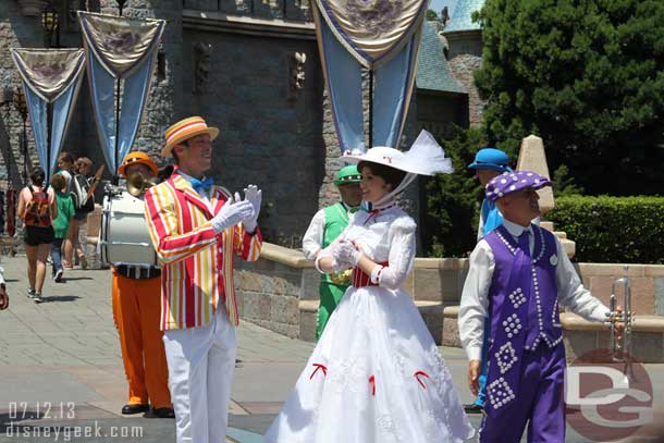 Mary Poppins and Bert with the Pearly band.