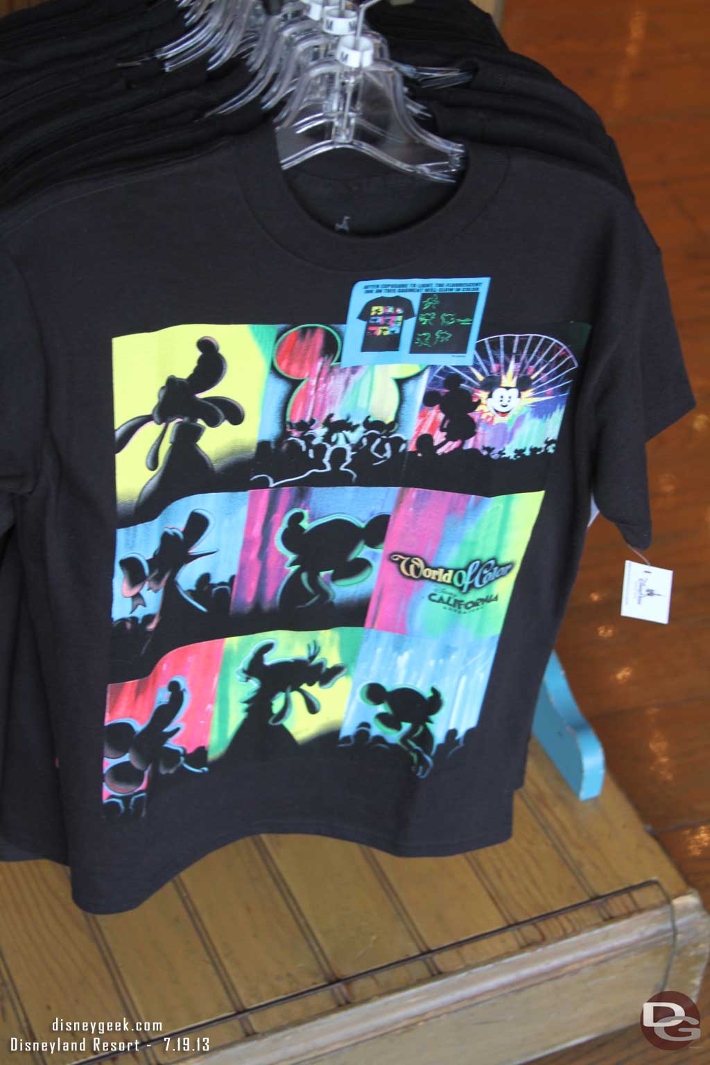 A World of Color shirt.