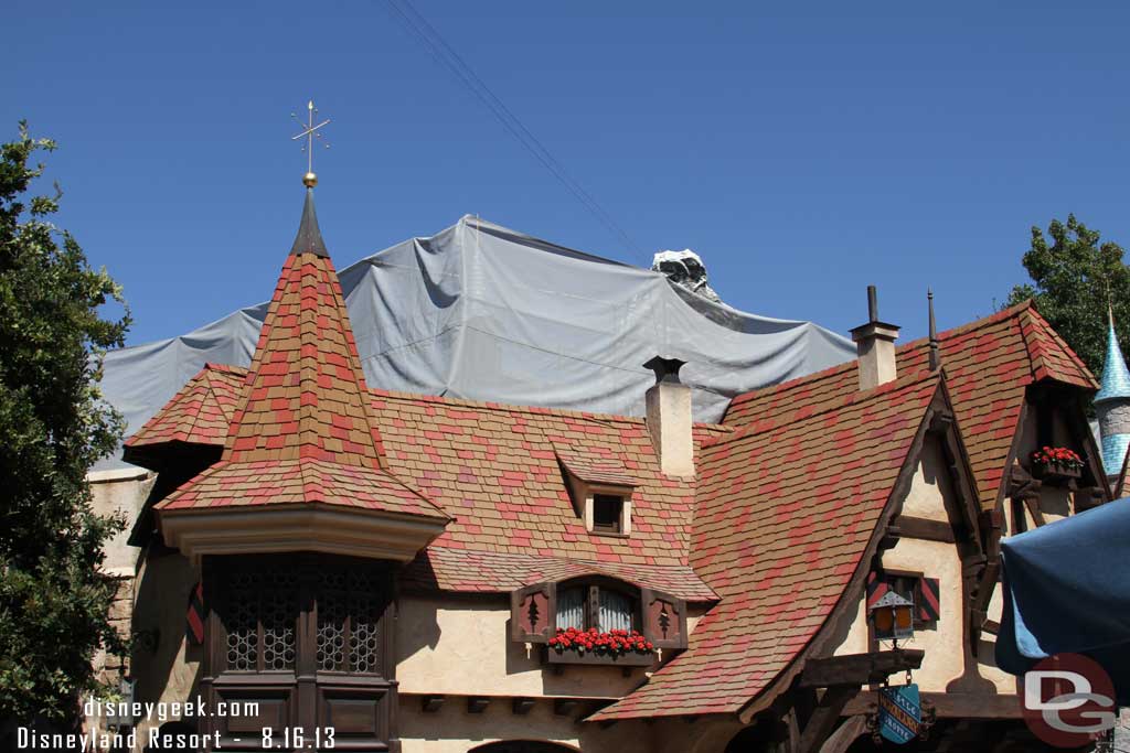 Scaffolding lines the rooftops in Fantasyland as they work on hiding the safety railings.