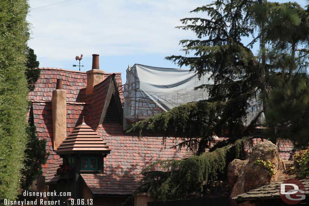 Work continues on the safety rails along the roofs of Fantasyland/