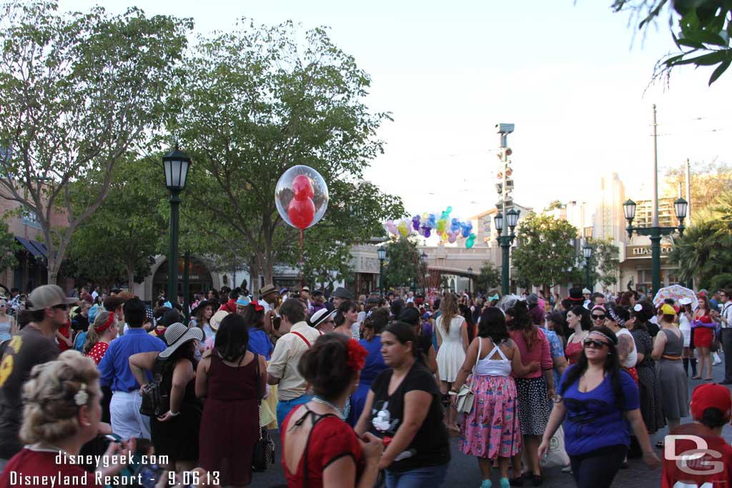 A group of Dapper Day guests gathering in Carthay Circle.