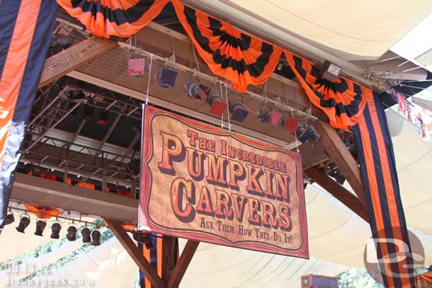 The pumpkin carvers are back (pics of their first day creations in a few pages).