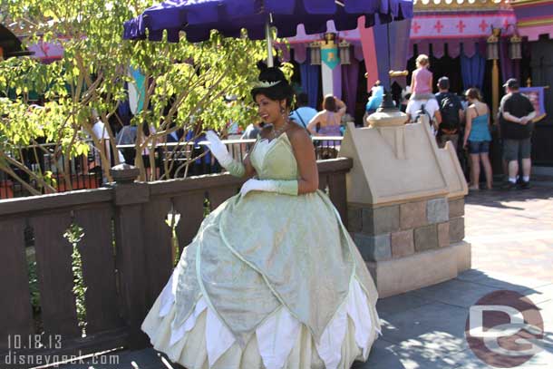 Tiana greeting guests on the way into Fantasy Faire