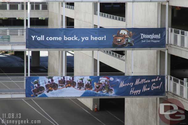 Christmas Banners up on the Mickey and Friends Parking Structure, same as last year.. Cars theme.