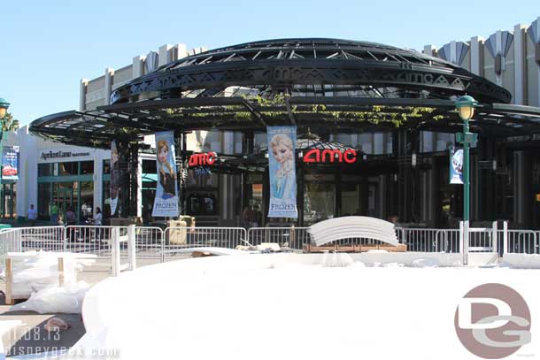 The AMC features Frozen banners.