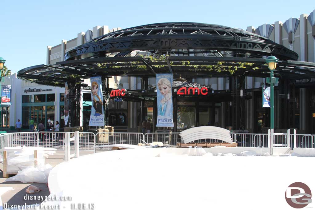 The AMC features Frozen banners.