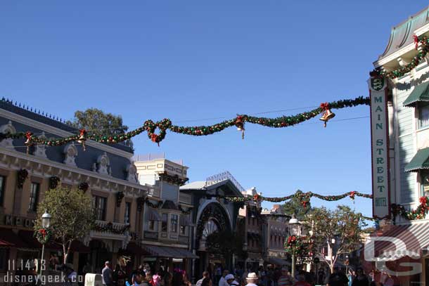 The traditional garland spans the street.