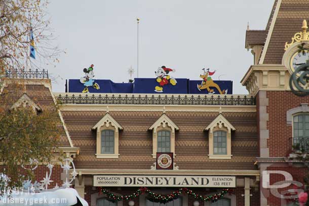 On my way to Disneyland.  They put some characters up on the train station on the backside of the Candlelight preparations