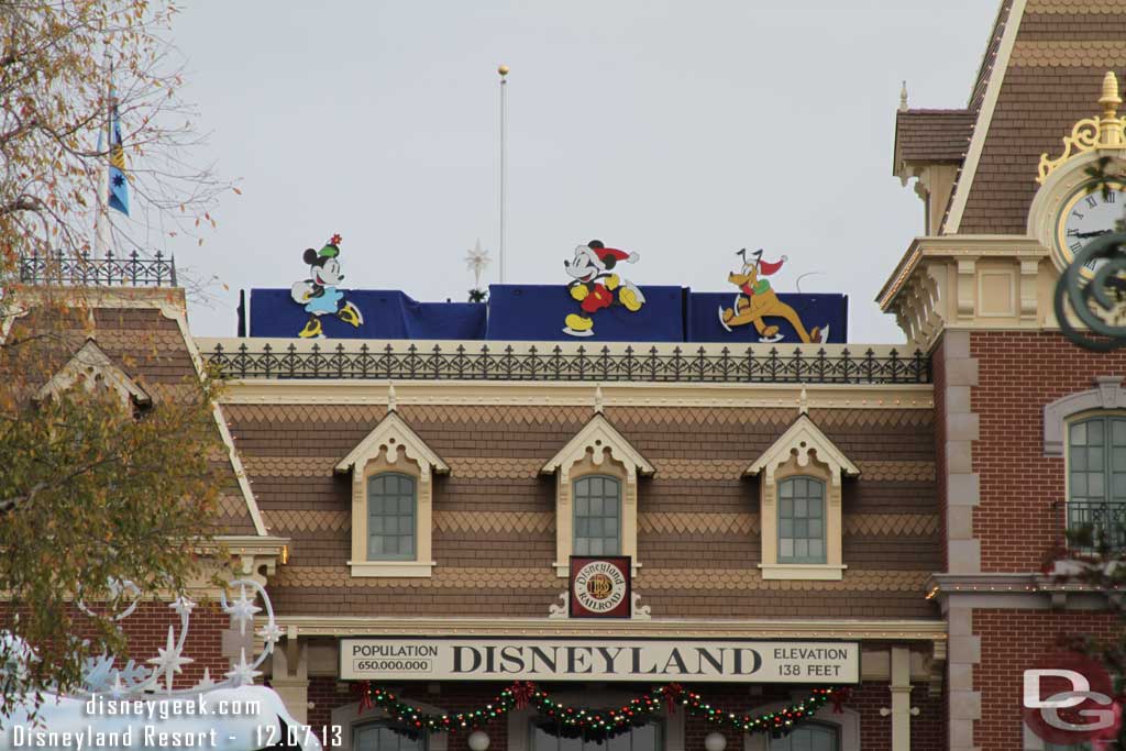 On my way to Disneyland.  They put some characters up on the train station on the backside of the Candlelight preparations