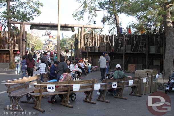 Benches, ropes, and arrows to help with crowd flow in Frontierland.