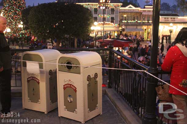 Returned to Disneyland for A Christmas Fantasy Parade.  They had the corners of the Train Station blocked off with rope and trash cans.  Guessing to help crowd flow.