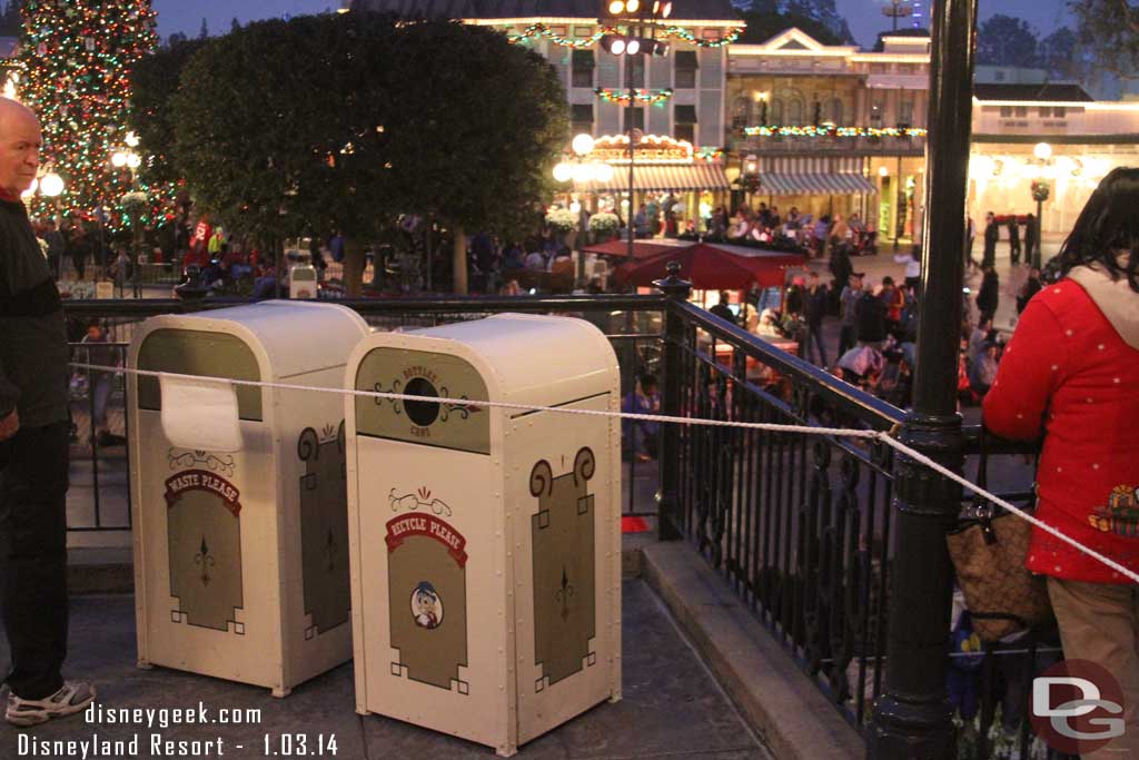 Returned to Disneyland for A Christmas Fantasy Parade.  They had the corners of the Train Station blocked off with rope and trash cans.  Guessing to help crowd flow.