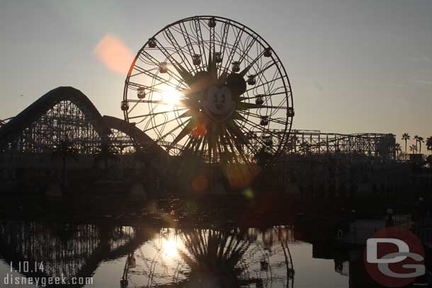 The sun slowly setting behind the Fun Wheel.