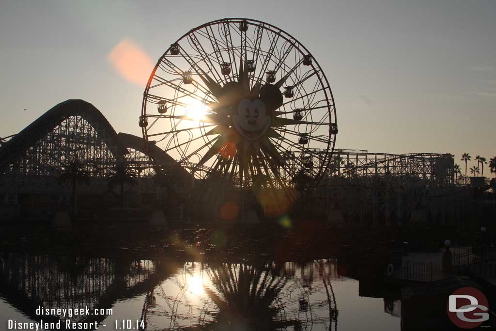 The sun slowly setting behind the Fun Wheel.