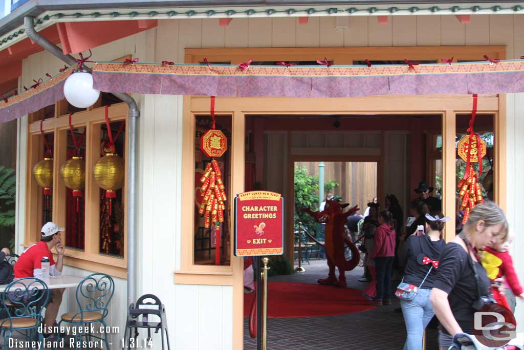 Mulan and Mushu were in a meet and greet location.
