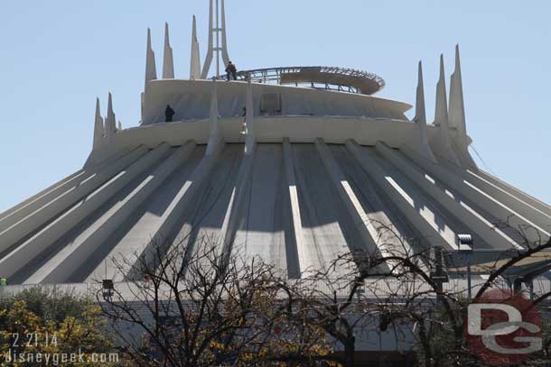 Over at Space Mountain there were several workers on the outside of the building.  A couple working on the new structure on the top.