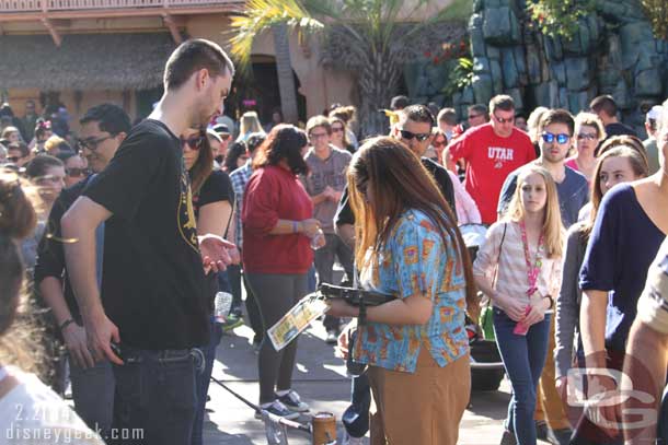 This was interesting.  A cast member taking orders for Dole Whips as guests stood in line as they look to speed up the waits.  I have seen this at the corn dog wagon too from time to time.  Do not remember seeing it here before though.