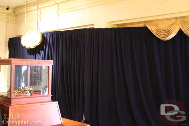 The main gallery area in the Opera House lobby was behind a curtain and you could hear them working behind it installing the exhibit.  But the small display with the benches to the left in this pic gave a preview.