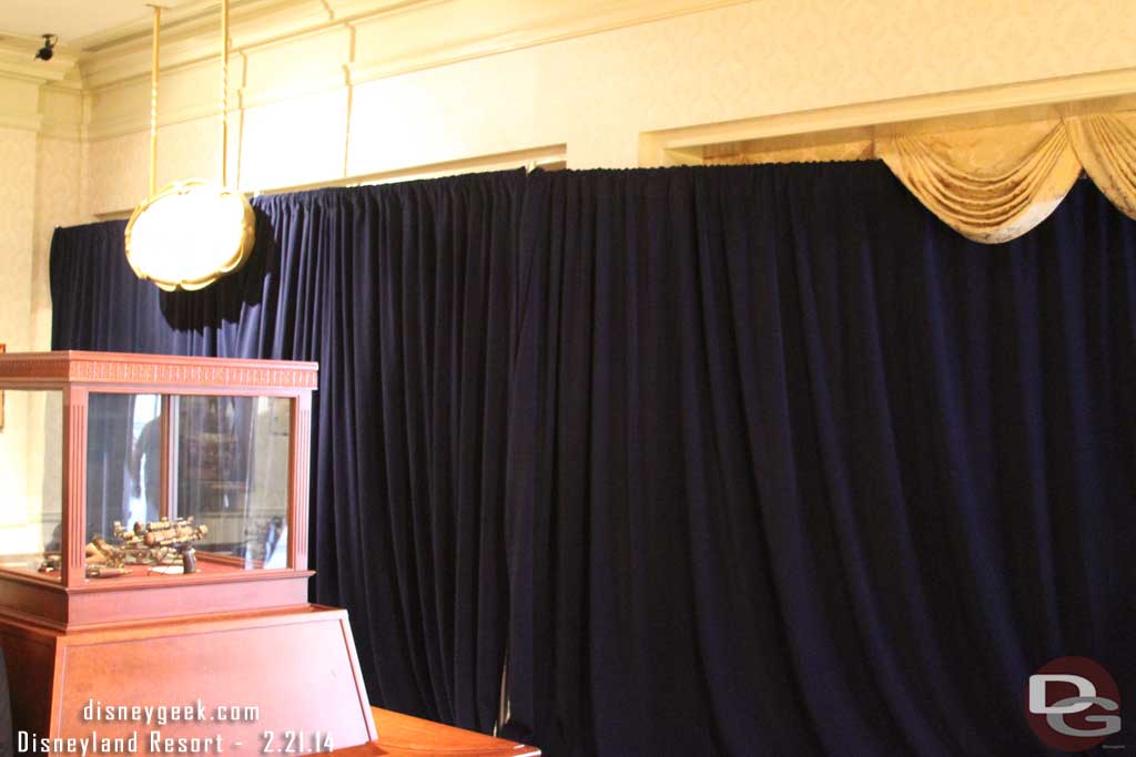 The main gallery area in the Opera House lobby was behind a curtain and you could hear them working behind it installing the exhibit.  But the small display with the benches to the left in this pic gave a preview.