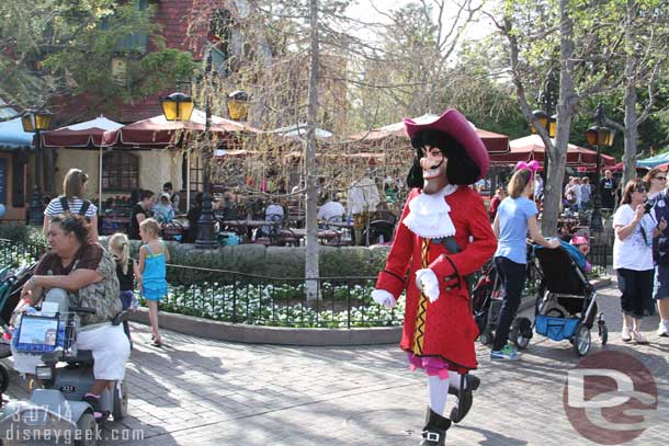 You never know who you will pass as you walk the parks... Captain Hook strolling through Fantasyland.