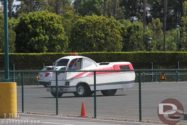 Started off walking across the Pinocchio lot to Downtown Disney.  Always looks odd to me to see a tram tractor without cars attached.  A couple of CMs were working on this one.