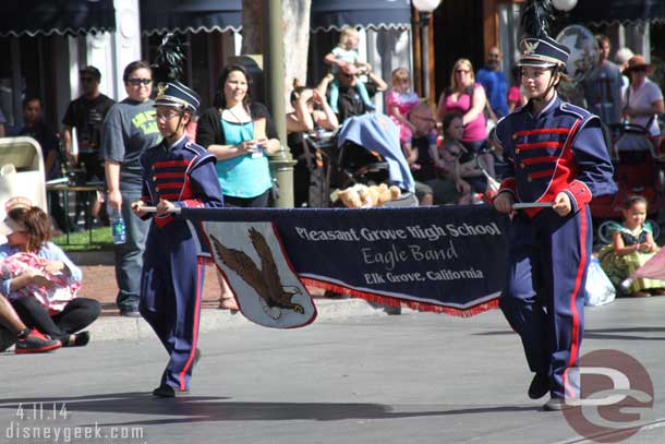 A High School band performing on Main Street.  They played a fun mix of Disney songs as they marched.. ranging from Let it Go to Fantasmic to Small World plus some Zip a Dee Do Dah.