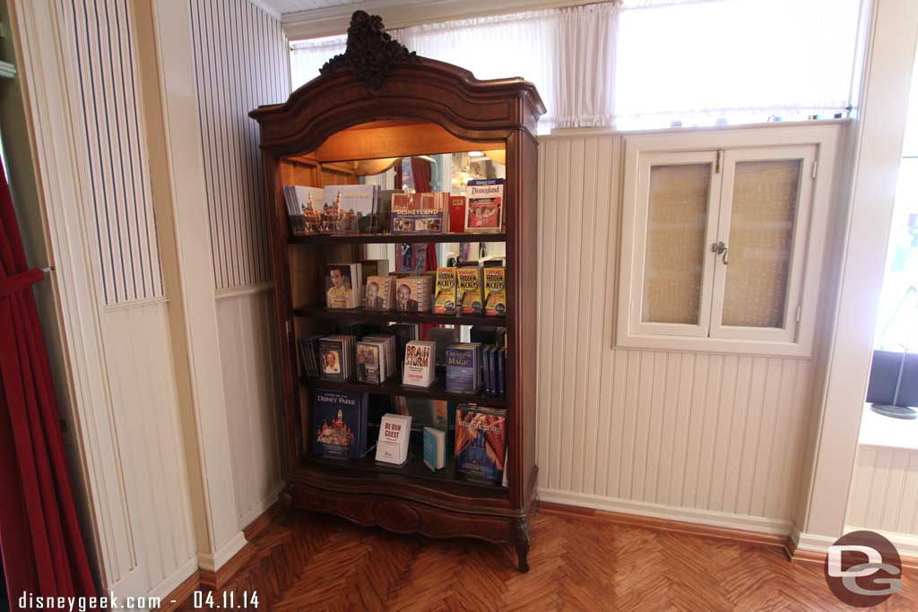 There is one small shelf of books.