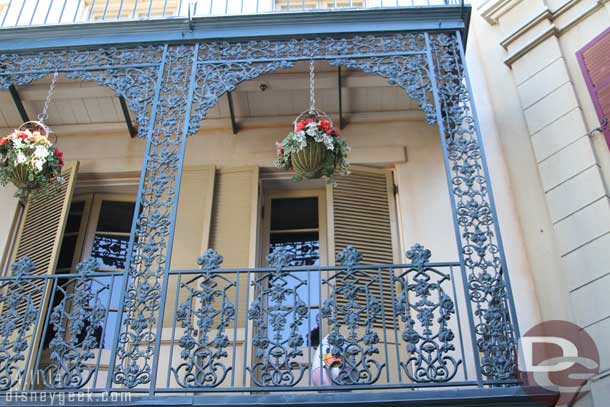 Daisy on a balcony in New Orleans (above the old Club 33 doorway).