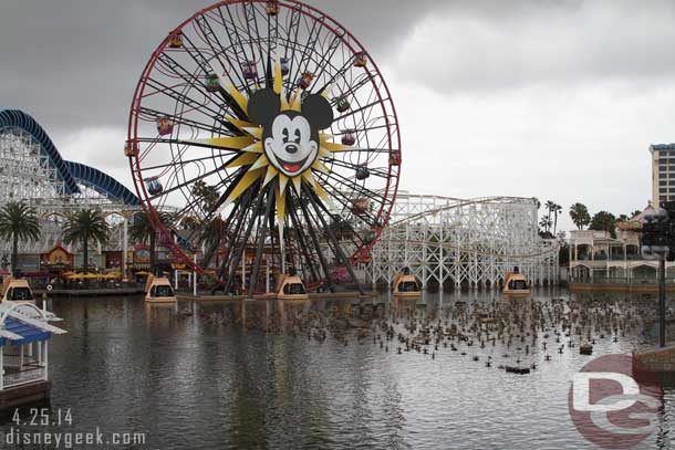 Preparing for World of Color on Paradise Bay as some darker clouds pass by overhead.