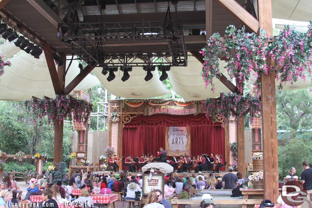 An orchestra performing.  The area was fairly quiet and the orchestra was playing some slow music even.  Not much energy in the Jamboree area during my visit.