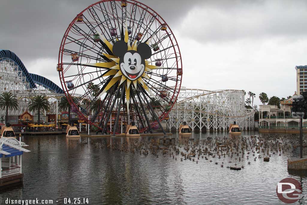 Preparing for World of Color on Paradise Bay as some darker clouds pass by overhead.