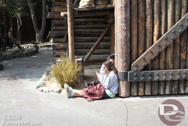 This was a common sight throughout the park.  Guests laying around or sitting anywhere they could find an electrical outlet.