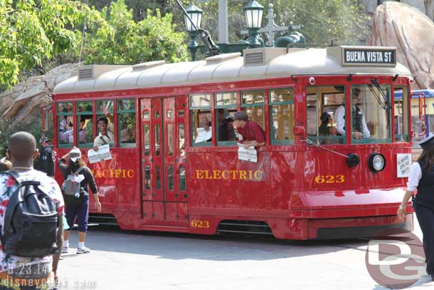 The Red Car News Boys rolling along after their performance.