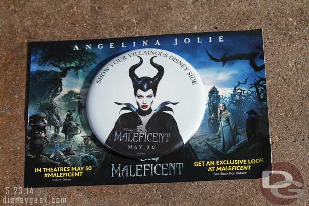 As you entered the park you were given a button and card promoting Maleficent.