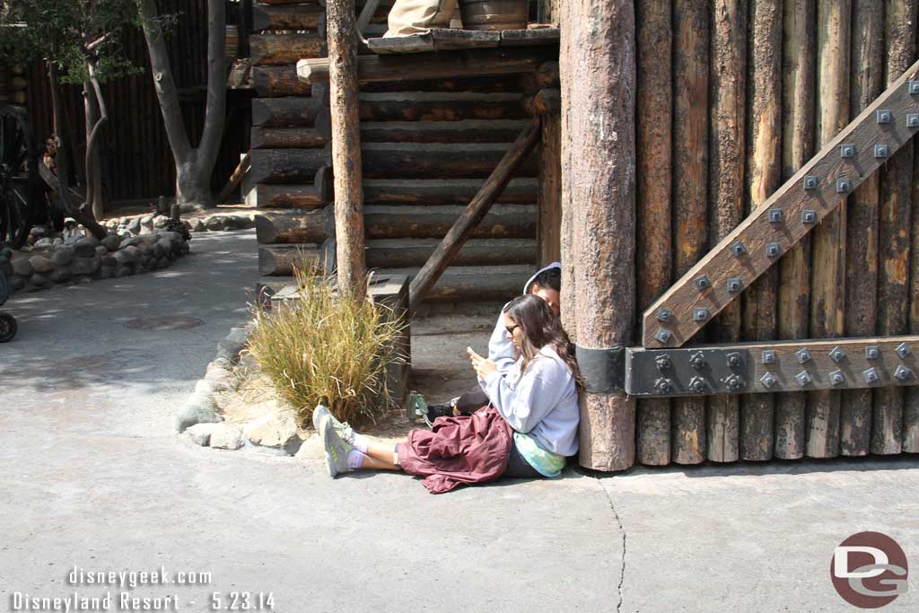 This was a common sight throughout the park.  Guests laying around or sitting anywhere they could find an electrical outlet.