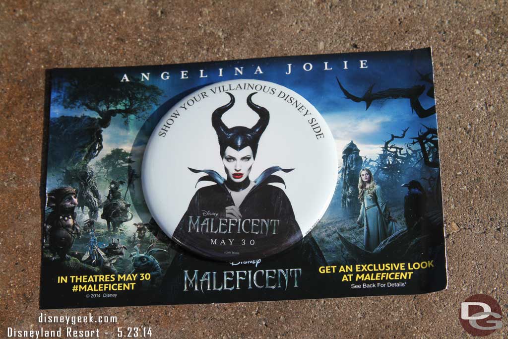 As you entered the park you were given a button and card promoting Maleficent.