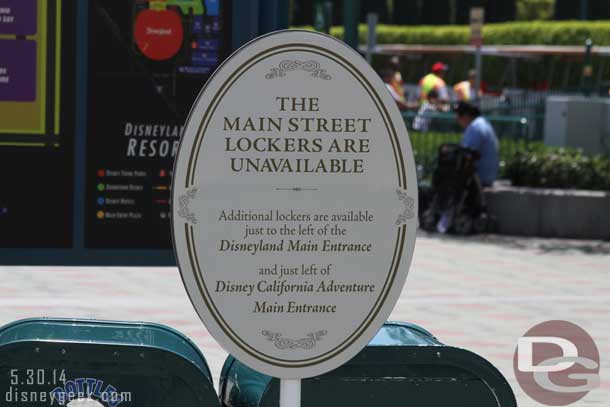 Plenty of signs warning you there are no lockers in Disneyland.