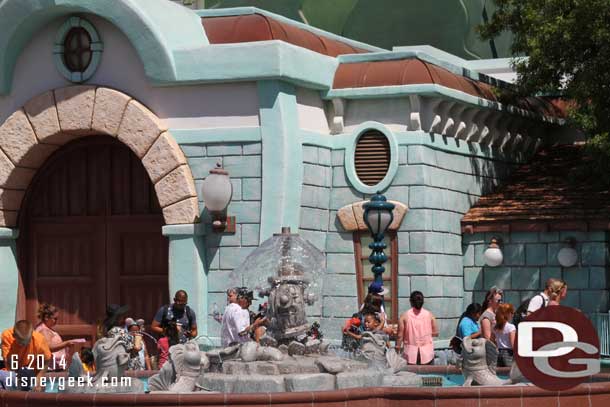 The fountain still features only the fire hydrant.