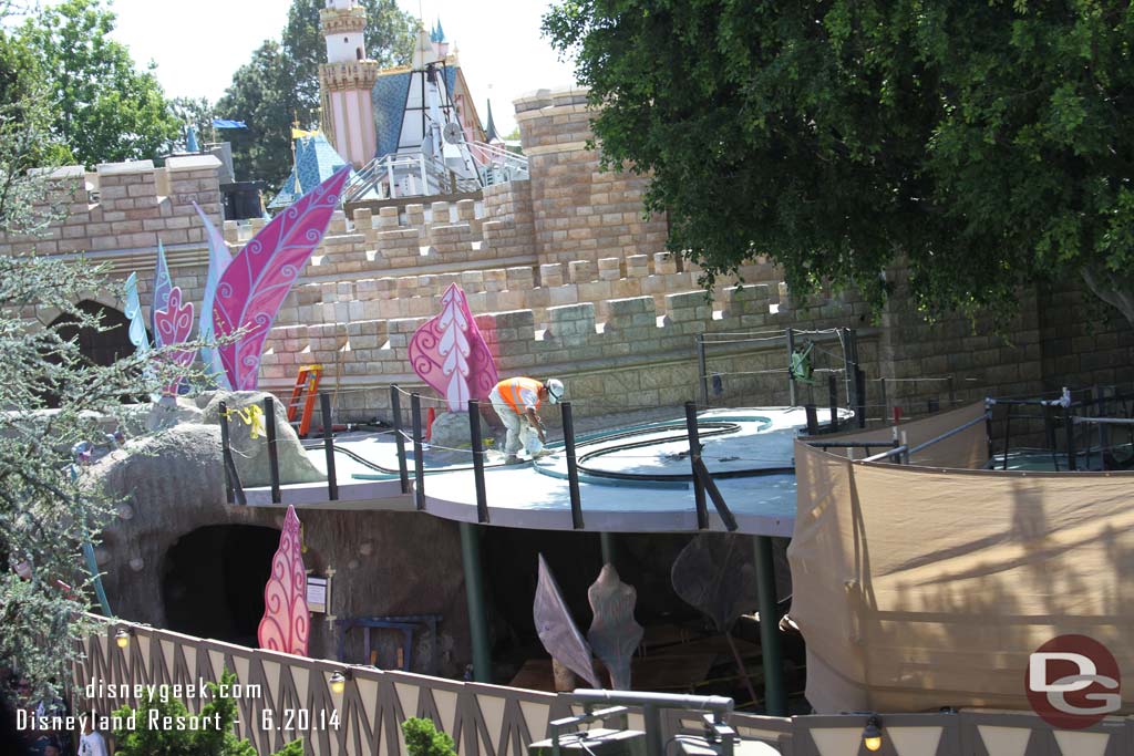 Time to check Alice in Wonderland.  They were working on the concrete surface as I passed by on the Monorail.