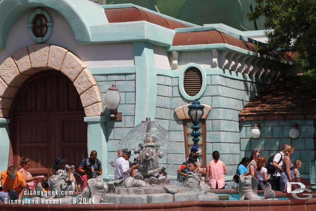 The fountain still features only the fire hydrant.