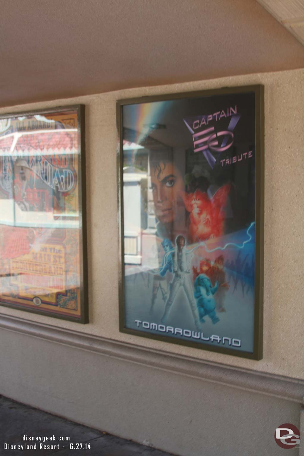 The Captain EO attraction poster is still up as you enter the parks.