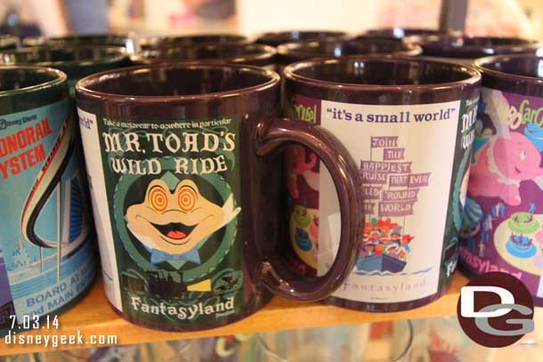 Attraction poster mugs.