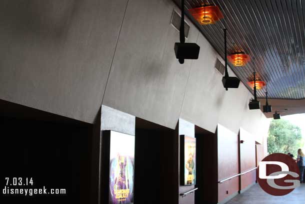 Movie posters lined the walkway.  Notice the overhead LCD screens are gone.