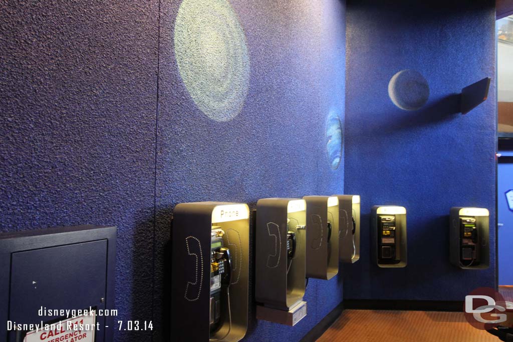 Find it humorous the large number of pay phones in Tomorrowland.