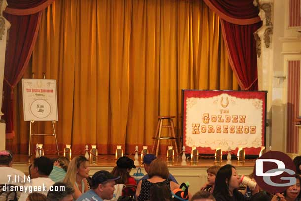 Inside the Golden Horseshoe the stage is set for Miss Lilly.