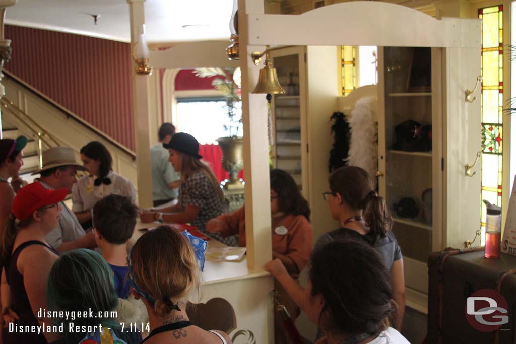 Guests making signs and interacting with Cast Members