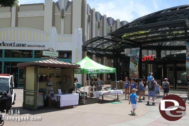 A couple of booths set up nearby selling merchandise.