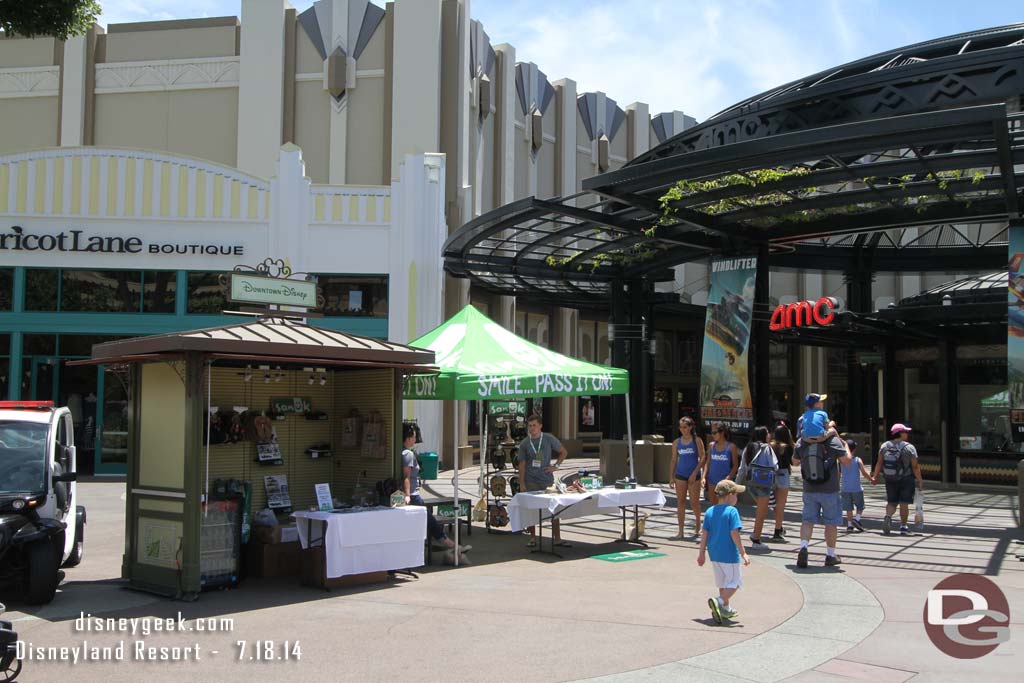 A couple of booths set up nearby selling merchandise.