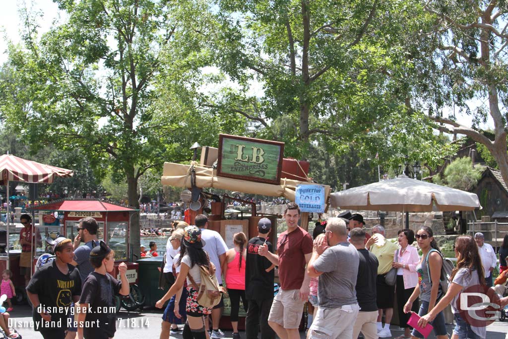 A new outdoor vending cart along the Rivers of America.