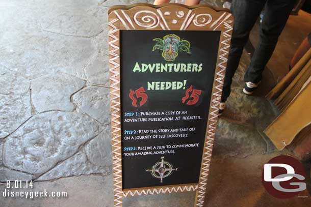 Inside a sign that sums up the experience.  You become an Adventurer.  You choose an adventure and pay $5 for a publication that explains it (or you can opt for a beverage that costs $7.50).  You then set off on our journey and complete the task.  You return and receive a Juju to mark the event and commemorate the adventure.